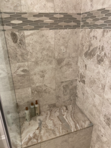 a bench in a shower